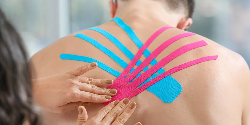 як клеїти тейпи на спину